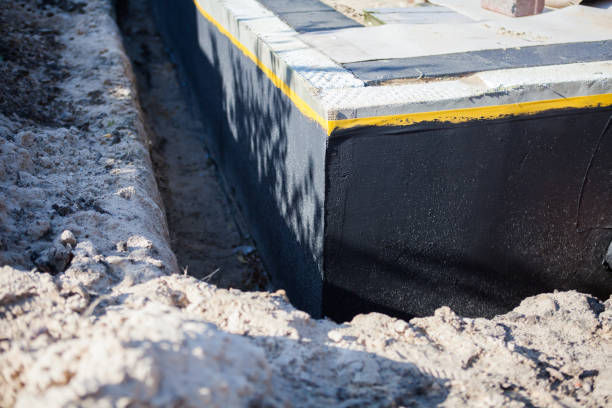 Professional Waterproofing technician working in Port Republic, NJ